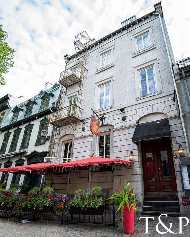 The exterior of the Auberge Place D'Armes Hotel