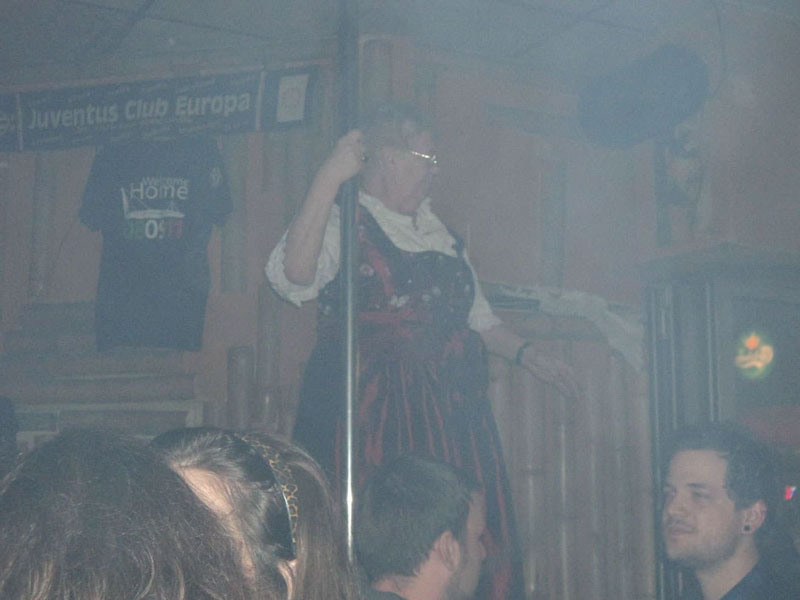 Woman dancing in Hamburg Reeperbahn at night