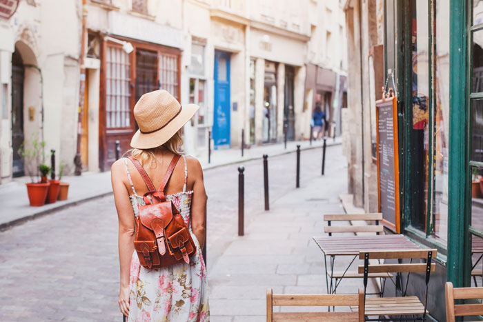 Girl traveling with a backpack 