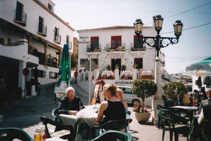 People sitting at a cafe ini Spain