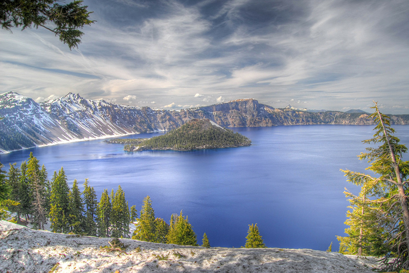 Crater Lake Oregon with clouds. this is one of the fun things to do in Oregon